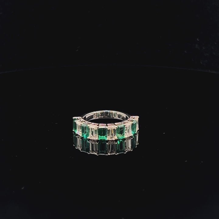 Intertwined Elegance: Emerald & diamond Half Eternity