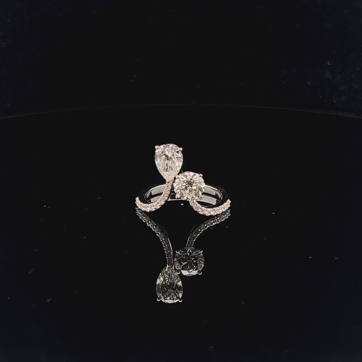 Exquisite 1.0ct Pear & Round Diamond Ring: A Harmonious Duo