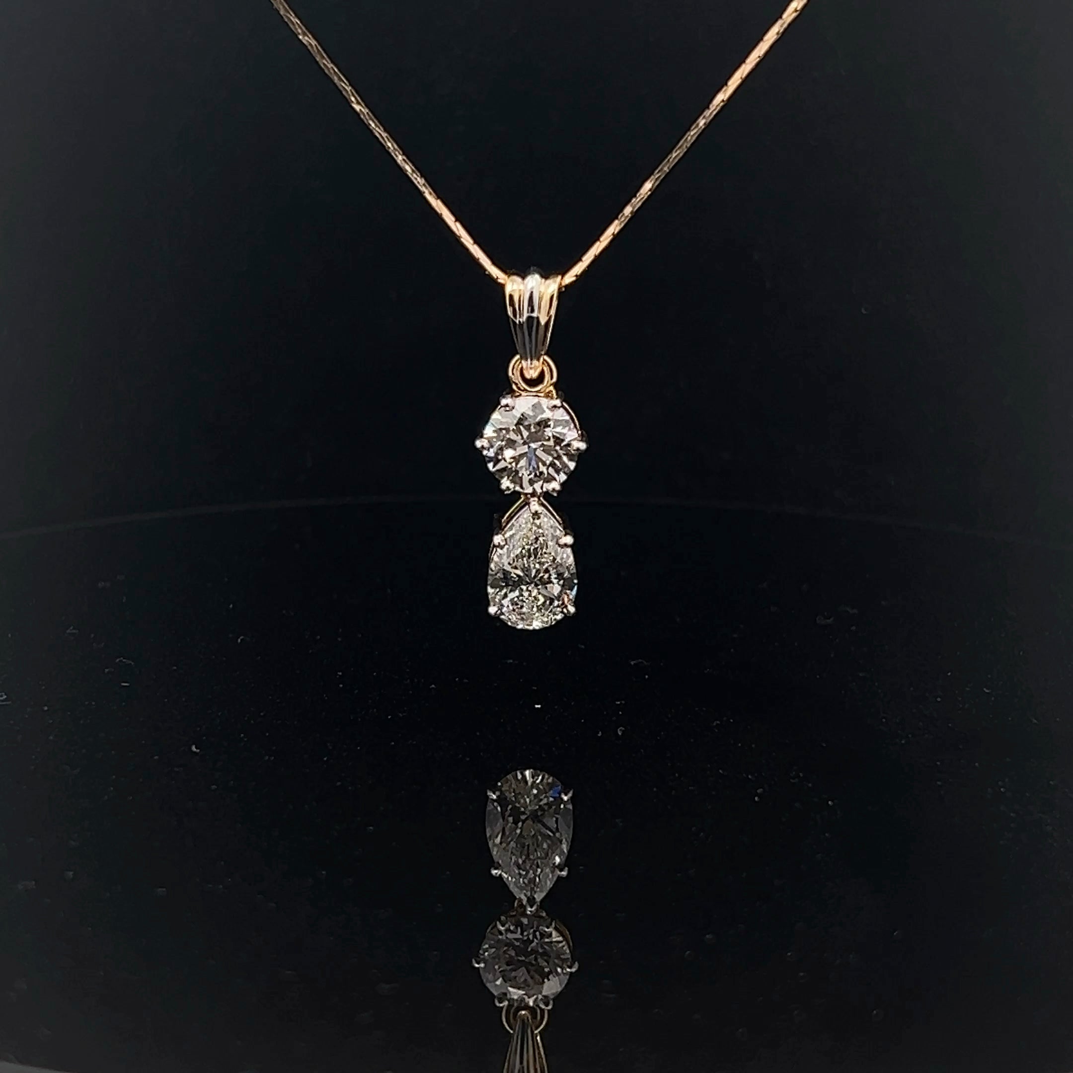 Round & Pear Diamond Pendant: A Classic Duo