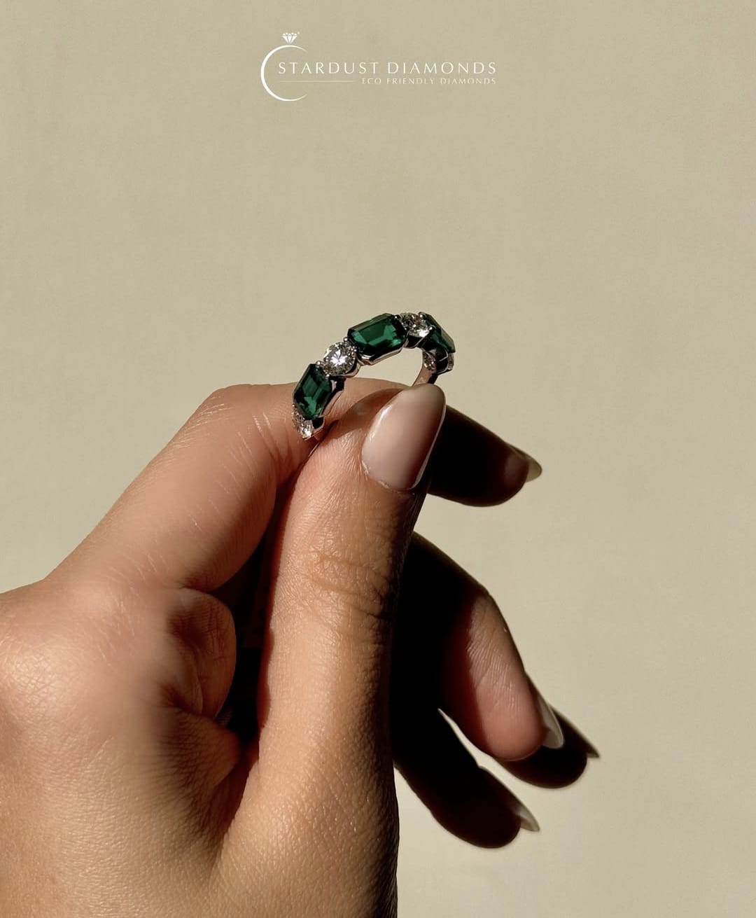 The Perfect Pair: Emerald & Round Diamond Half Eternity