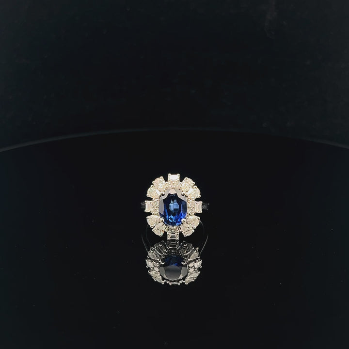 The Midnight Bloom: Oval Blue Gemstone Halo Ring